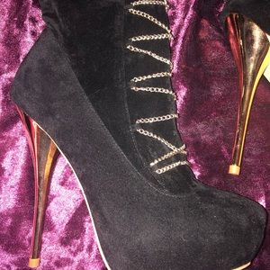 Black knee high , high heels